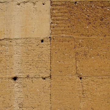 Old rammed-earth wall with deterioration, in France
          Grégoire Paccoud